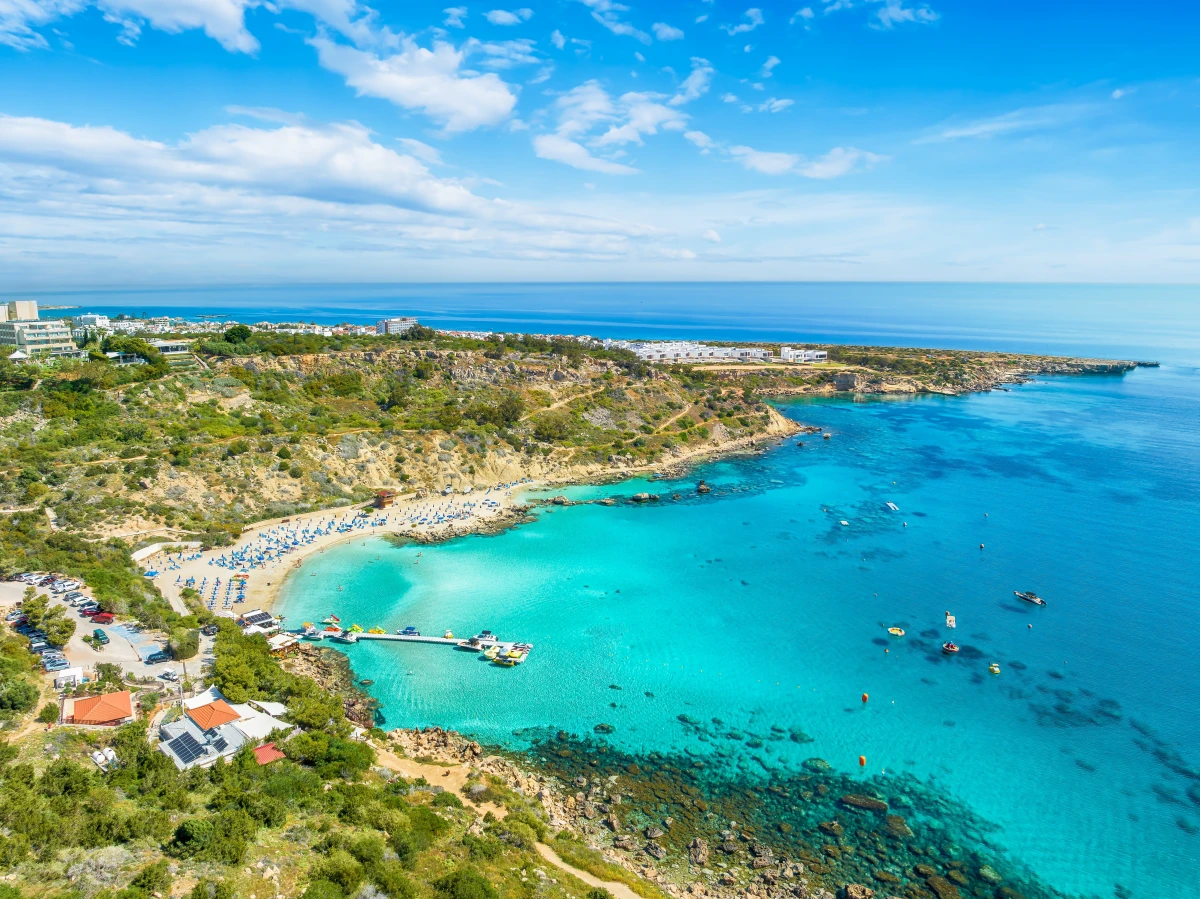  A beautiful natural bay surrounded by cliffs and greenery. Calm waters make it perfect for swimming and relaxing.