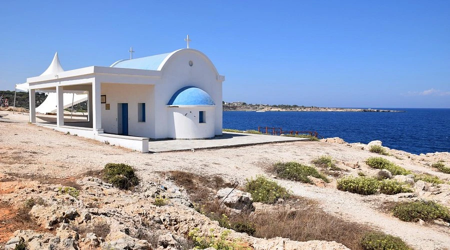  A small chapel built into the rock above the sea — one of the most unique and photogenic spots on the coastline.